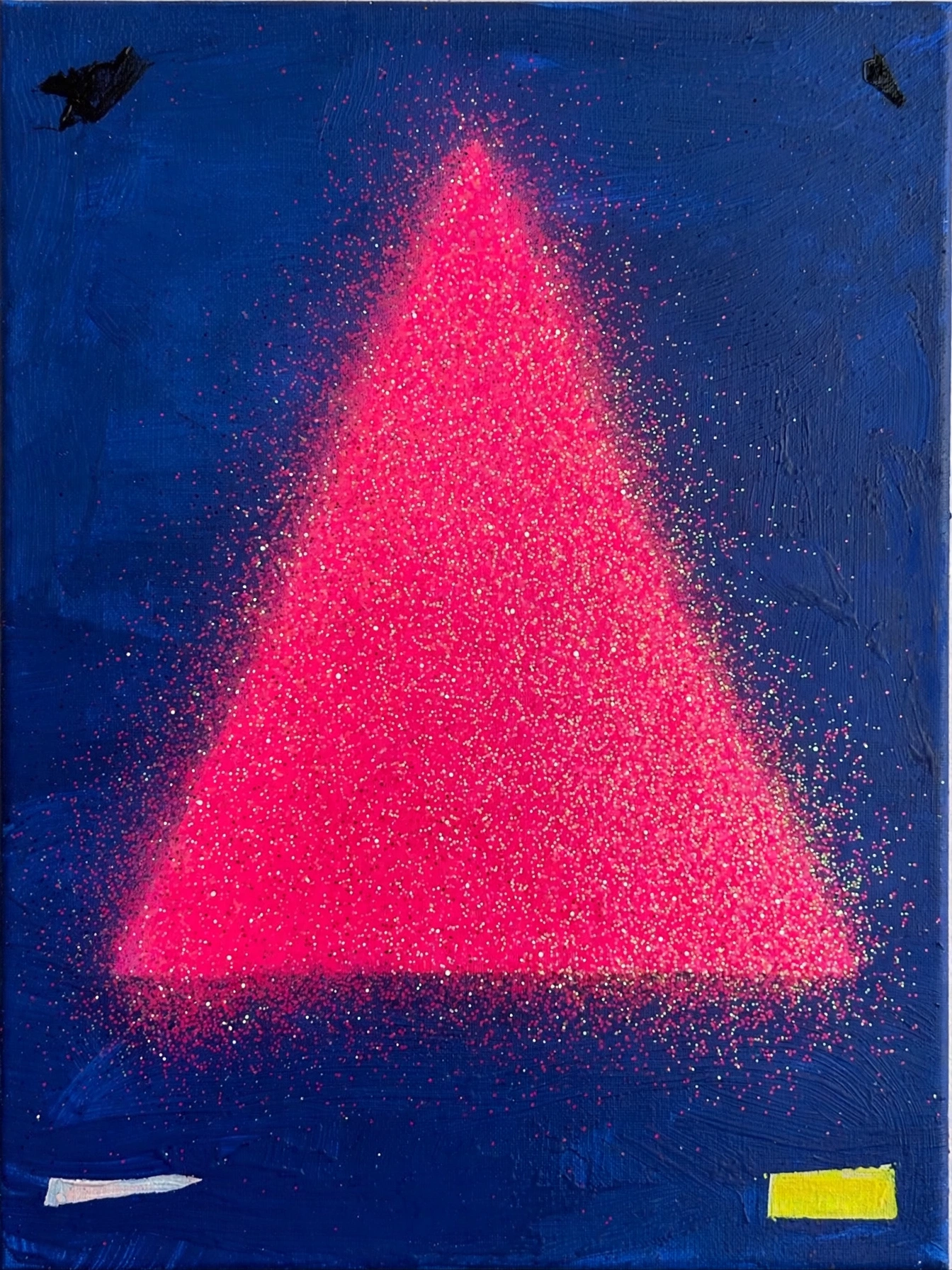 A monumental hot-pink glitter triangle with heavy spray texture dominating a flat matte ultramarine blue field, tiny flat shapes scattered at the edges